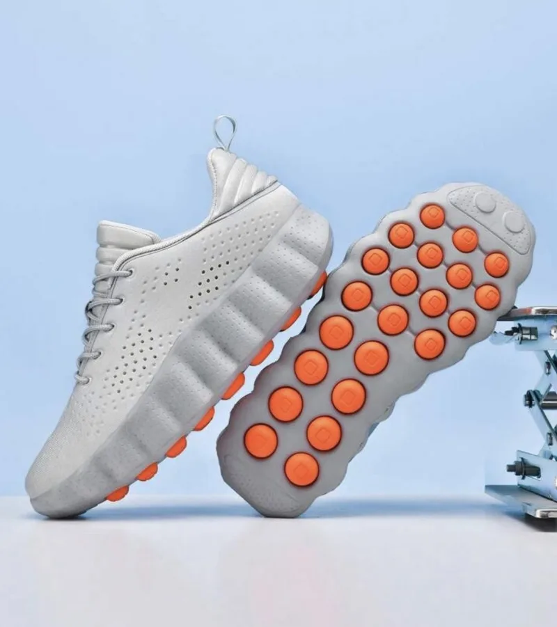 Chaussures de sport à technologie de massage